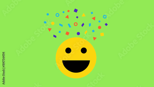 A happy yellow smiley face with colorful geometric shapes above it on a green background, symbolizing joy and creativity.