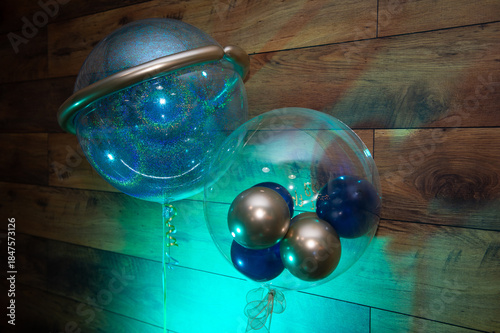 Bright multi-colored inflatable balloons for holiday decoration.