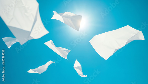 White Paper Airplanes Flying in Clear Blue Sky with Sunlight