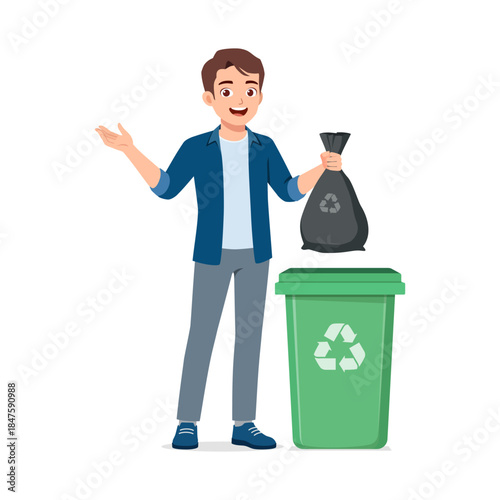 Smiling happy man standing with a green recycling bin holding a black trash bag ready to dispose of waste