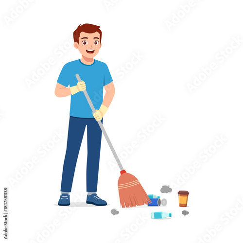 Smiling Young Man Joyfully Sweeping Up Litter and Garbage with a Broom Cleaning Environment