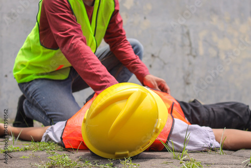 Εκτύπωση καμβά Workplace Accident Scene With Worker Checking on His Unconscious Colleague