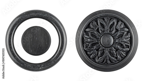 Two circular decorative elements, one with a floral motif and one with a central void, both dark gray