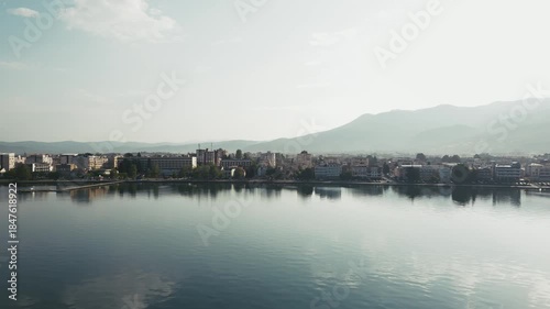 Stunning morning view of Ohrid, city on the shore of the lake, foggy morning, 4k