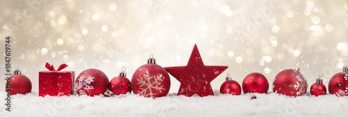 Festive Red Ornaments on Snow with Sparkling Bokeh Background