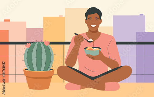 A man enjoying a meal on a rooftop surrounded by plants and cityscape