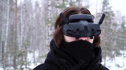 pilot controlling fpv drone through googles