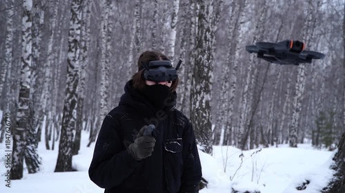 pilot controlling fpv drone through googles