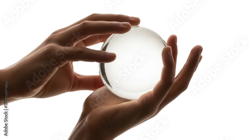 Photos Isolated hands holding a crystal ball, showcasing its transparency and round sha