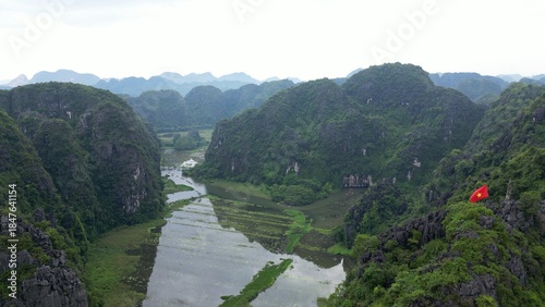 Asia, Ninh Bình and Tam Coc  in the Red River Delta region of Vietnam -  limestone karst formations emerge from rice paddies and rivers 