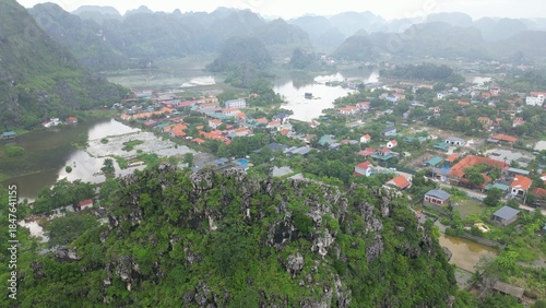 Asia, Ninh Bình and Tam Coc  in the Red River Delta region of Vietnam -  limestone karst formations emerge from rice paddies and rivers 