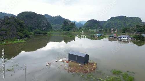 Asia, Ninh Bình and Tam Coc  in the Red River Delta region of Vietnam -  limestone karst formations emerge from rice paddies and rivers 