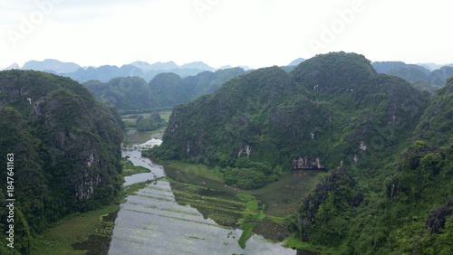 Asia, Ninh Bình and Tam Coc  in the Red River Delta region of Vietnam -  limestone karst formations emerge from rice paddies and rivers 
