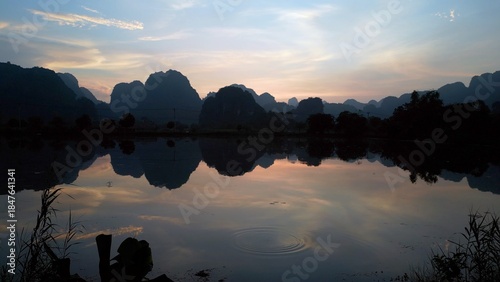 Asia, Ninh Bình and Tam Coc  in the Red River Delta region of Vietnam -  limestone karst formations emerge from rice paddies and rivers 