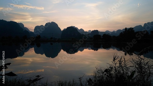Asia, Ninh Bình and Tam Coc  in the Red River Delta region of Vietnam -  limestone karst formations emerge from rice paddies and rivers 