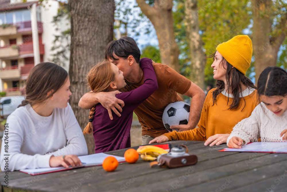 Obraz premium Happy family enjoying quality time together in park