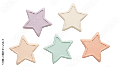 Isolated assortment of pastel star shapes against a plain background in soft colors