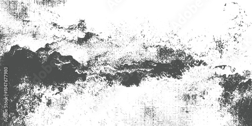 Dark gray abstract texture with distressed grunge effect and scattered dots