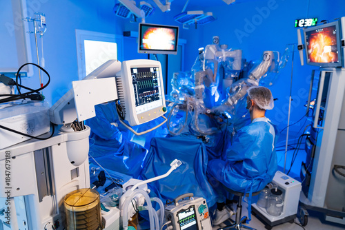 Robotic surgery operating room overview. Advanced surgical robotics and team in clinical environment