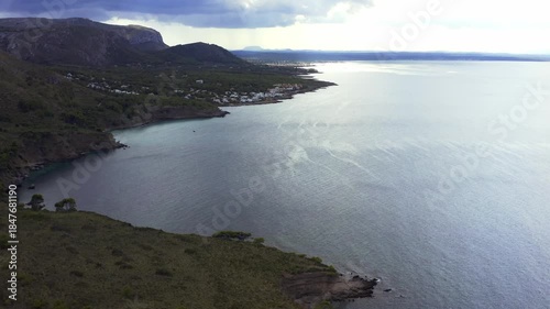 Aerial view of beautiful coastline in Betlem, Mallorca, with calm turquoise sea, natural shoreline. Scenic Mediterranean landscape, travel, summer vacation, tourism concept.