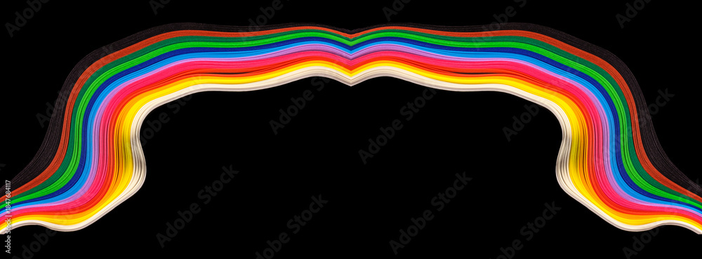 Obraz premium a wavy, multicolored ribbon-like pattern against a solid black background, abstract arrangement of vibrant, rainbow-colored paper strips appear to be curled or wavy, creating a dynamic visual effect