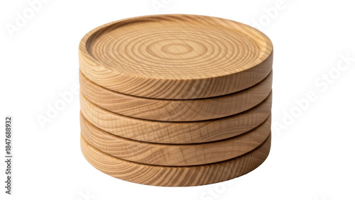 Photos Isolated stack of wooden coasters close up with concentric grain pattern, table