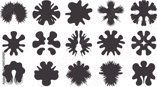 Fifteen black irregular symmetrical abstract shapes white