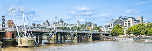 Photography A panoramic riverside view of the Golden Jubilee Bridges and Charing Cross stati