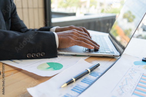 Experienced lawyer providing legal guidance in office, reviewing contracts, documents, finance, justice matters, advising clients during meetings and transactions professionally.