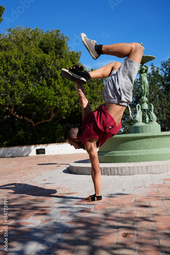 Man performing physical exercise for strength and balance