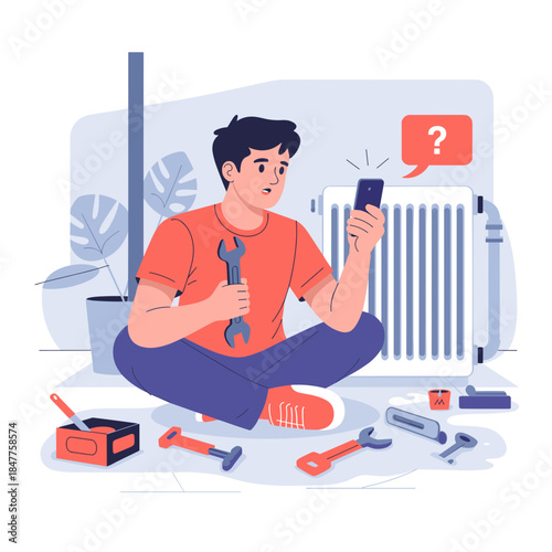 Young man sitting on floor with wrench and smartphone near radiator  