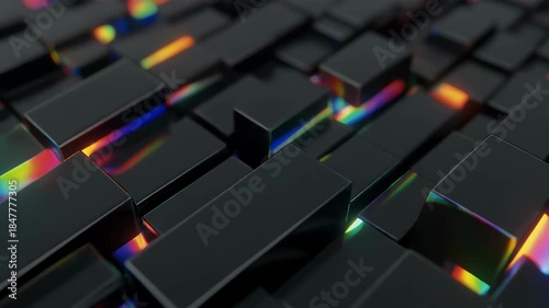 Abstract background of dark, reflective rectangular prisms with iridescent light refractions.