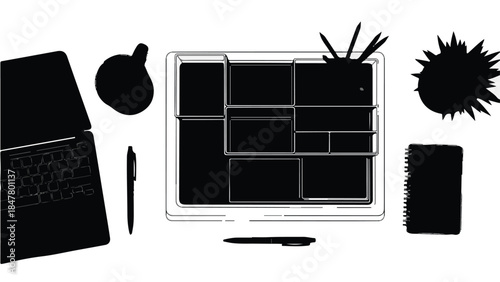 Flat lay of office desk with laptop and stationery