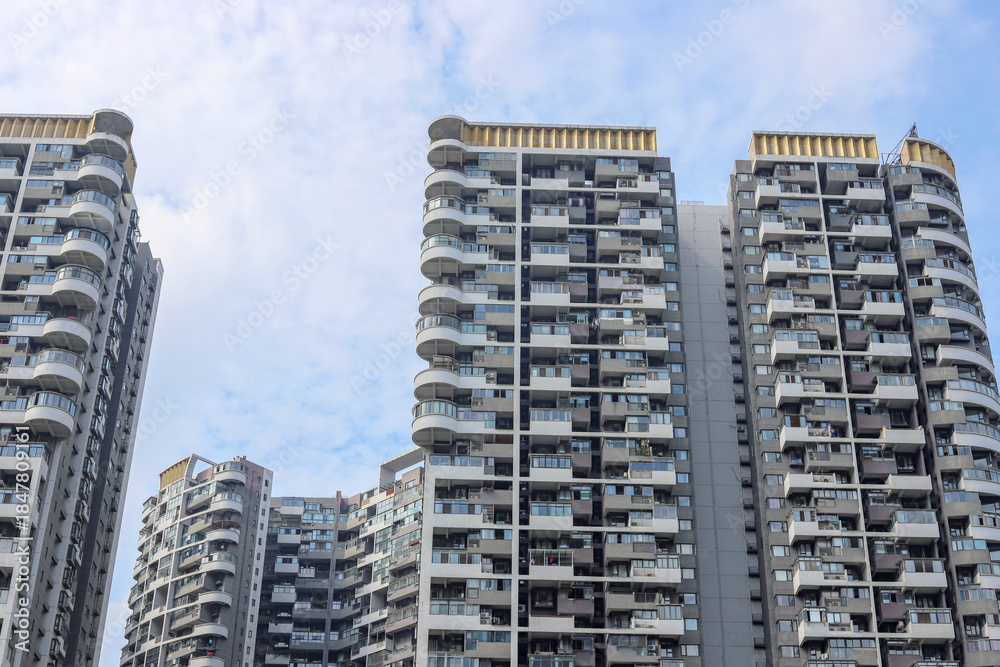 Fototapeta premium High-rise residential apartments and commercial buildings in the city