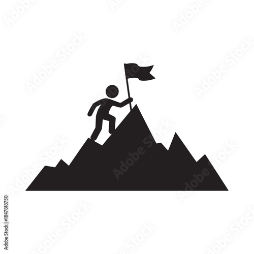 A silhouetted figure reaches the summit of a mountainous peak with a flag