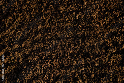 Photos Close up of black soil background