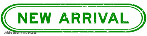 Grunge green new arrival word rubber seal stamp on white background