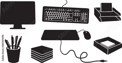 Office workspace with computer and stationery supplies