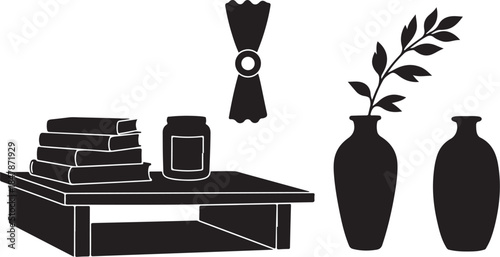Modern home decor with books and vases on a table