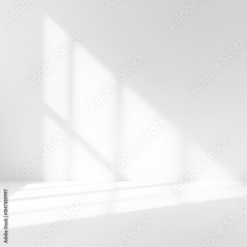 Φωτογραφία Minimalist white room interior featuring soft diagonal window light and shadow o
