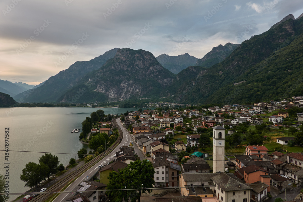 Fototapeta premium Aerial view of Pian di Spagna nature reserve and Lake Mezzola landscape with mountains and wetlands in Lombardy Italy