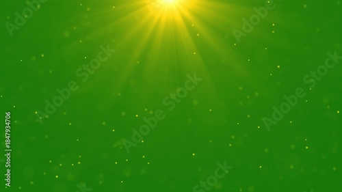 particles and light shining down. Light from the sun. green screen.