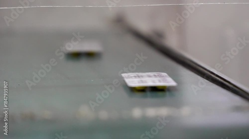 Making Medicine Pills Process. Pharmaceutical production line. Manufacture of tablets. Supply conveyor device. Industry line of medical products