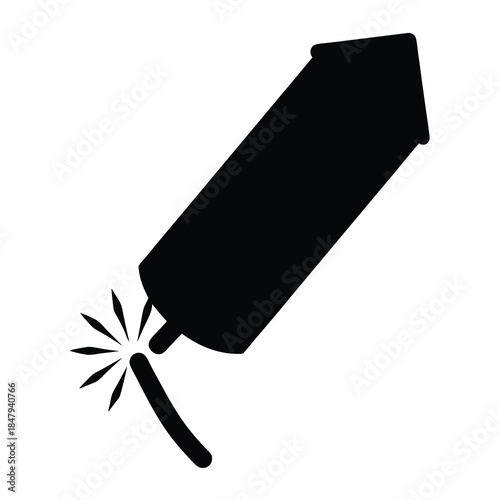 Black silhouette of a firework with the fuse burning ready to launch