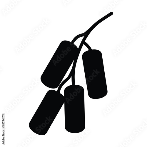 Black silhouette of a bunch of berries hanging from a branch