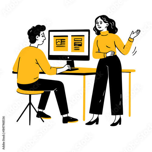 Two colleagues collaborating on computer in modern workspace