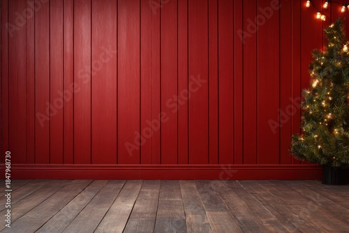 Red paneled wall with wooden floor and a lit Christmas tree in the corner, festive warm glow. Warm, soft glow