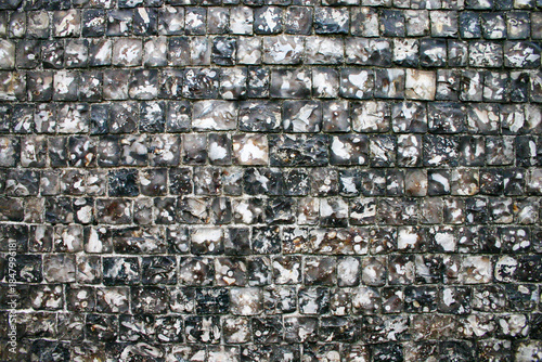 Fotografija Knapped flint stone wall texture