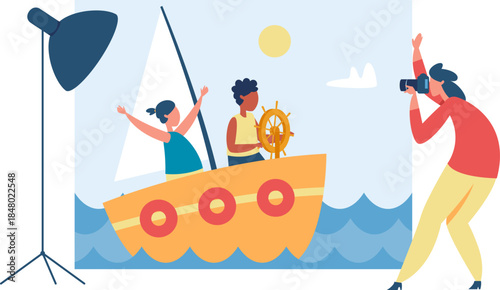 Photographer shooting children sailing on ocean backdrop