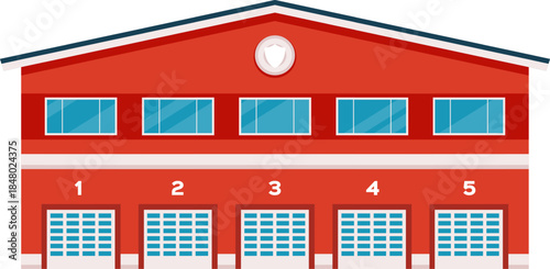 Red emergency services station building with five garage doors